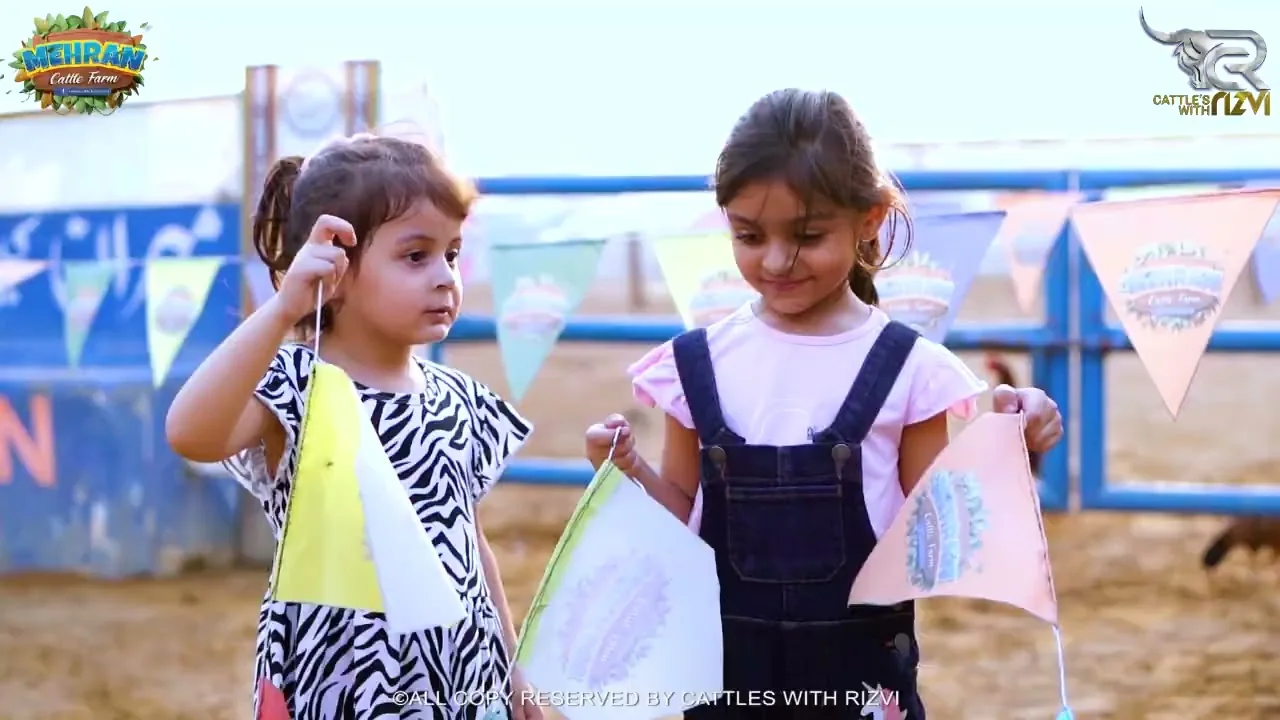 Young visitors with bunting at the farm
